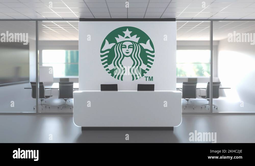 STARBUCKS logo above reception desk in the modern office, editorial