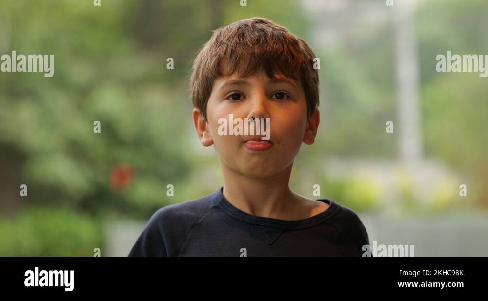 Portrait boy sticking out tongue Stock Videos & Footage HD and 4K