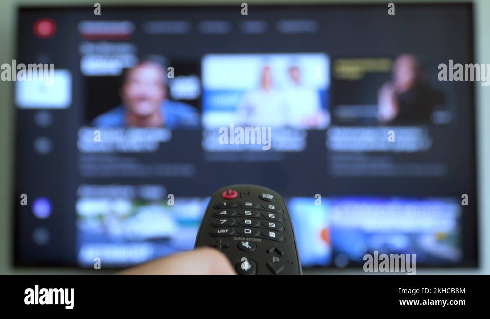 Smart tv screen and hand with remote control. Online video streaming service Stock Video Footage