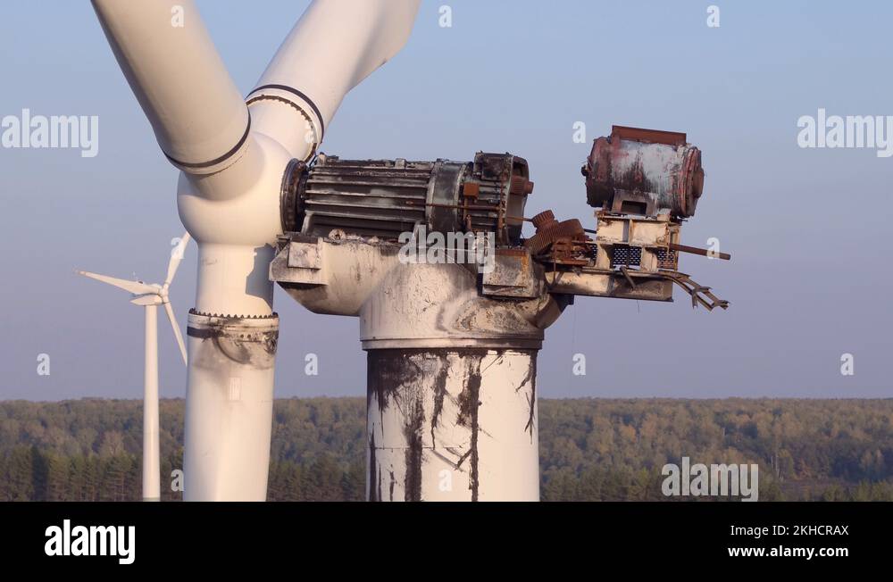 Wind energy farm turbine destroyed / old damaged by fire after