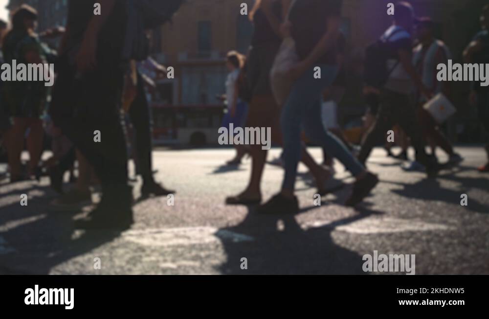 Crowd of anonymous people walking on busy city street in Barcelona ...