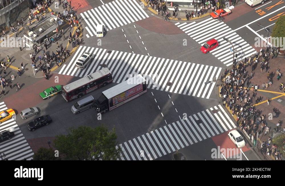 Timelapse of crowds of people crossing roads in Shibuya district