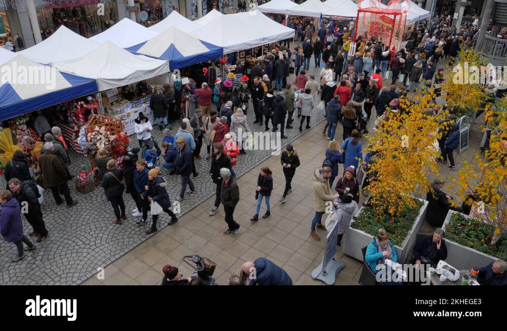 People visiting the Christmas market stalls at the Arc Shopping Centre ...