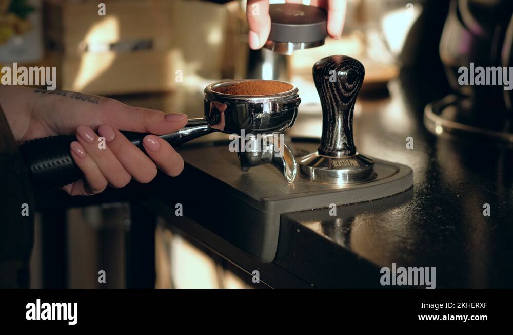 Making coffee process. Barista's hands with tamper Stock Video Footage