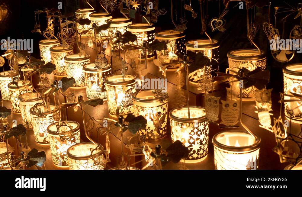 candle carousels for sale on a Christmas Market LONDON, ENGLAND DECEMBER 10 Stock Video