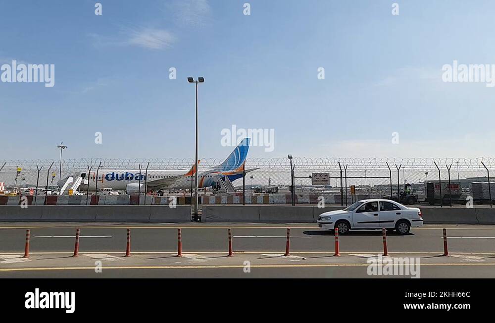 Commuting car passing next to the Dubai International Airport premises