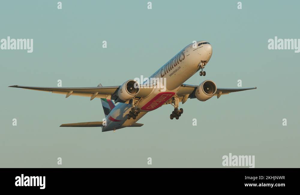 airplane emirates boeing 777 departure super slow motion late evening