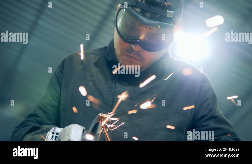 Welder using welding saw Stock Videos & Footage HD and 4K Video Clips