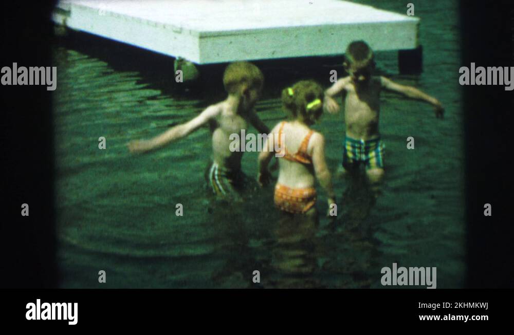 LYNBROOK NEW YORK1973 Lake Kids In Water Kids Summer Time Stock Video