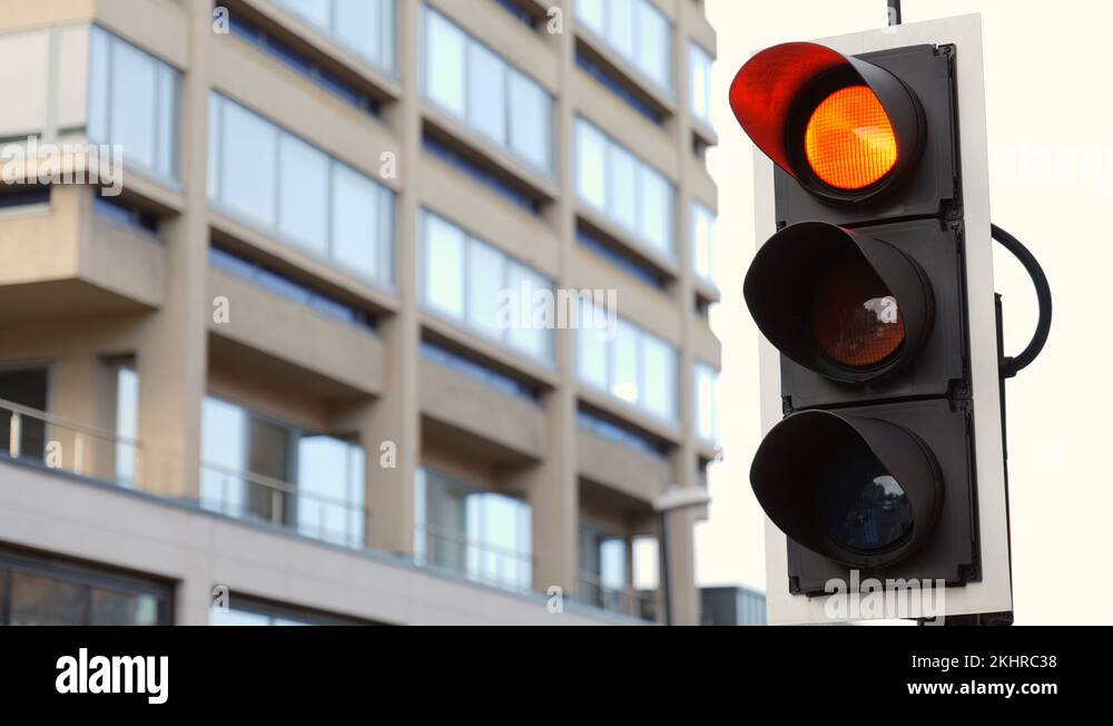 British Traffic Lights Changing From Red to Green Close Up With Green