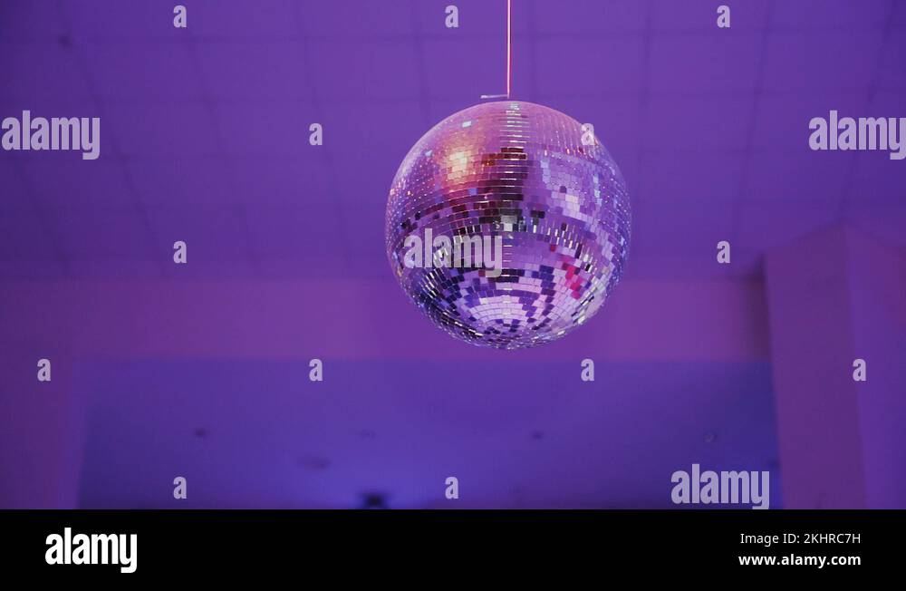 Beautiful large mirror ball in the club on the ceiling Stock Video