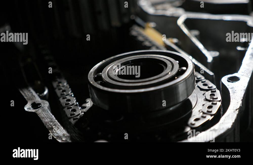 Ballbearing rolling being fixed to a cogwheel in a modern metallic