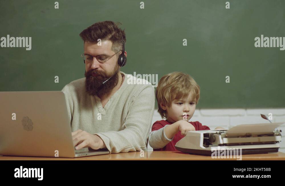 Old typewriter and laptop on table. Concept of technology progress