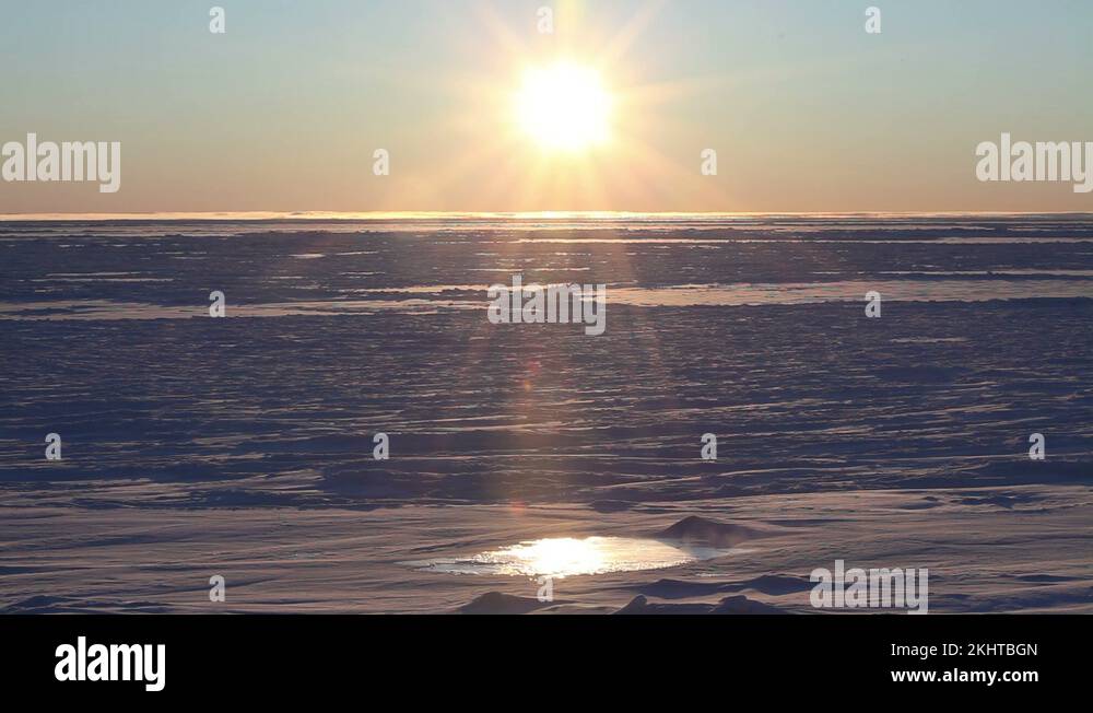 Steaming water pool on melting polar ice sheet Stock Video Footage Alamy