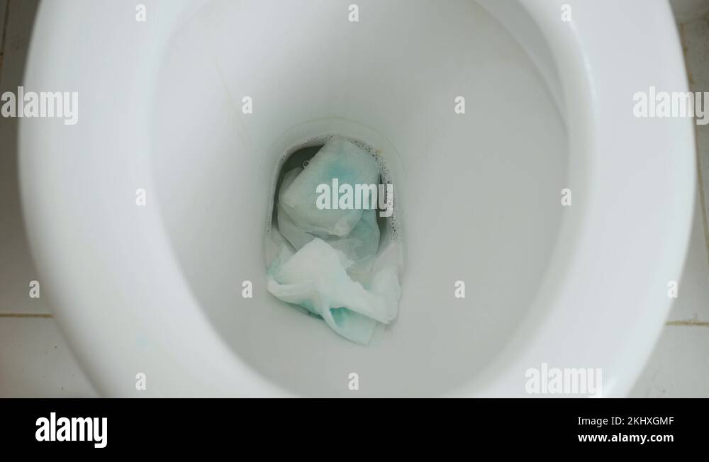 Flushing Water in the Toilet, Water Cleaning the Dirt from Inside the