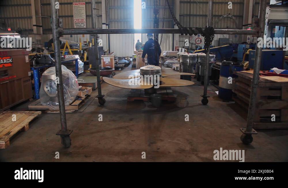 Massive propeller for cruise ship in warehouse of dry dock