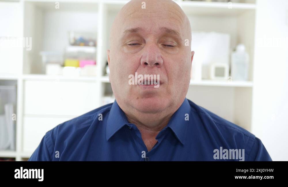 Slow Motion with Sick Elderly Person Coughs and Sneezes Spreading