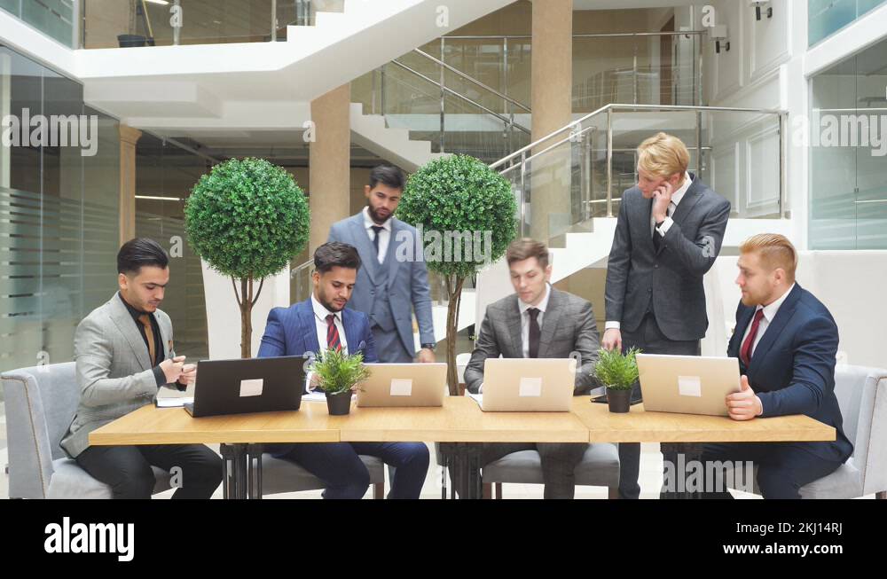 Young leaders representatives of different countries shaking hands to ...