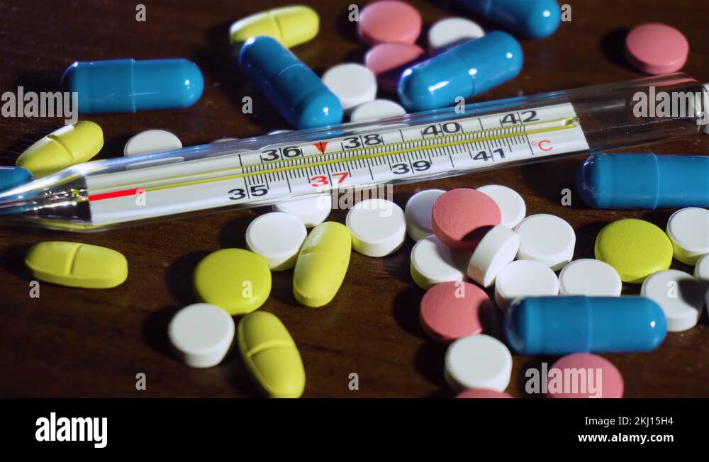 Mercury thermometer on antibiotics and pills using animation shows