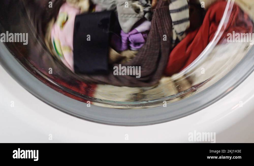 Static lower half of a washing machine starting up its cycle and