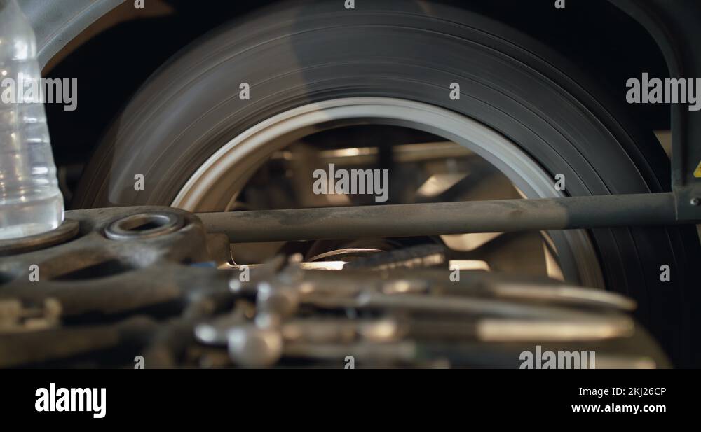 Balance process of tire on wheel in tire mounting Stock Video Footage