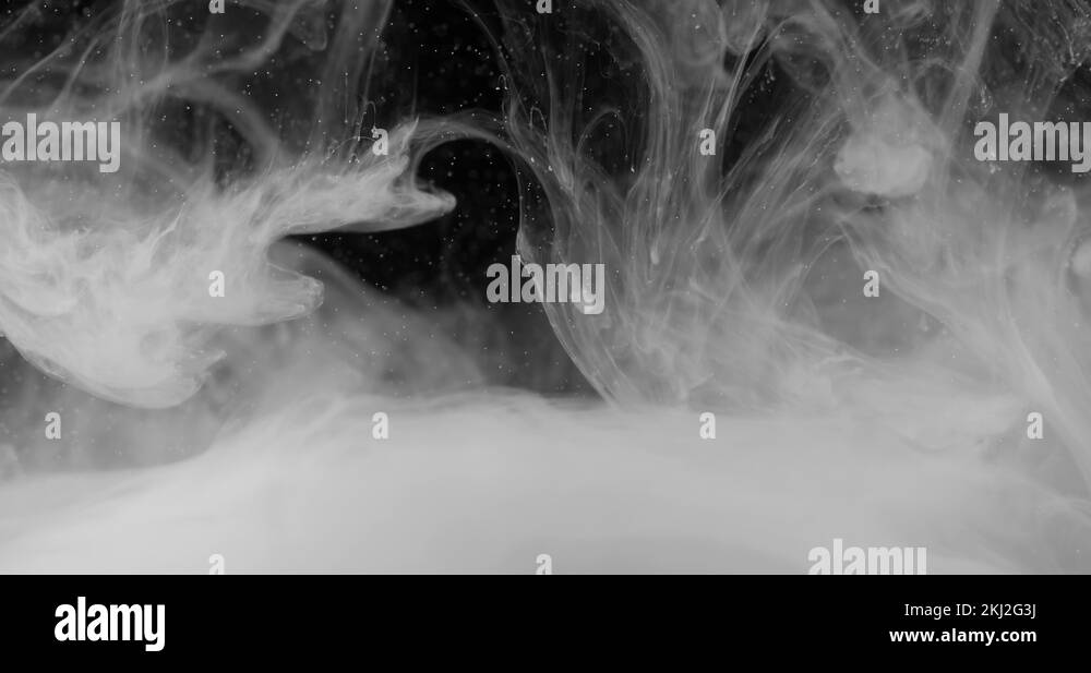 White ink spreads in water, smoke spreading underwater. Black and white