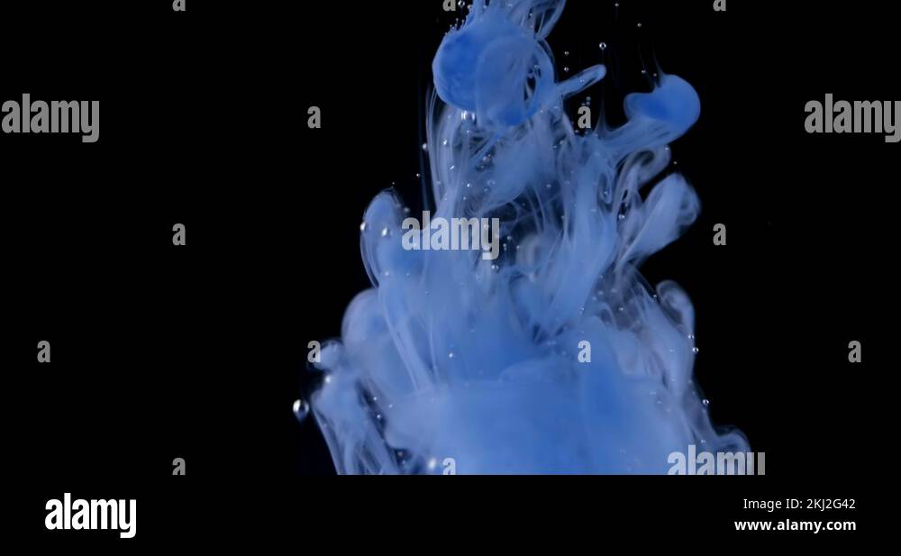 Blue ink spread in water, air bubbles and colored smoke spreading