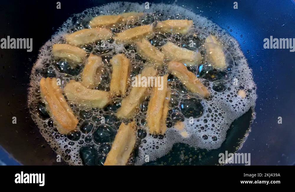 Making churros over the stovetop. Bubbling oil. Disney released their