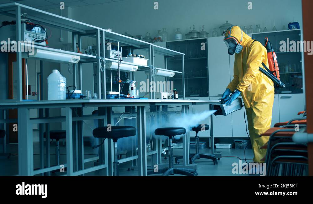 Chemical fumigation of a quantorium done by a disinfector Stock Video Footage Alamy