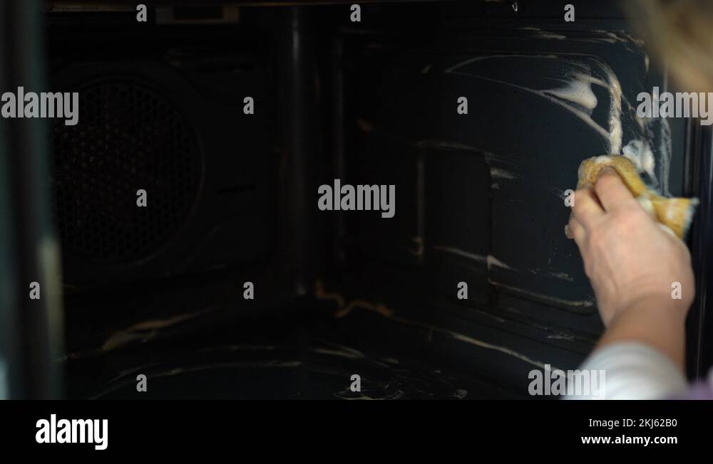 Cleaning of dirty greasy electric oven with toxic chemicals, removing