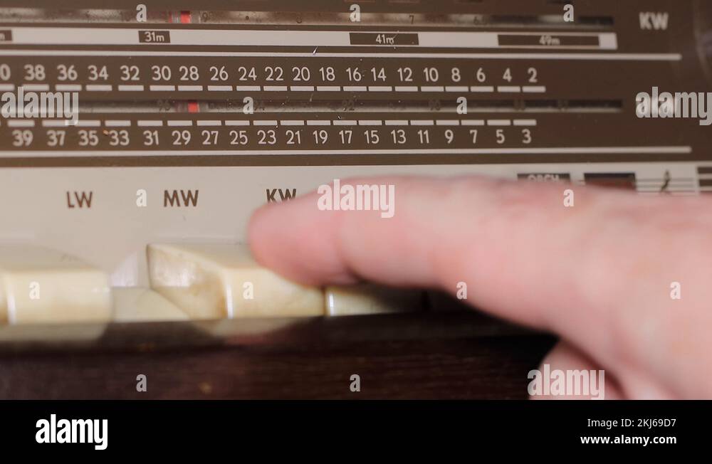 Tuning Analog Radio Dial Frequency on Scale of the Vintage Receiver