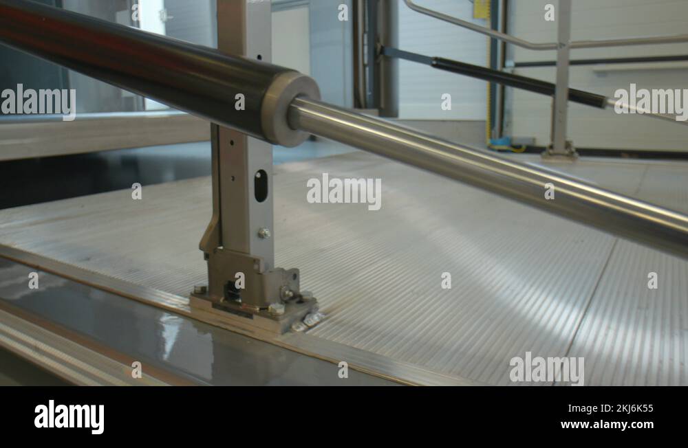 Trailer tailgate dolly movement from left to right. Empty cargo truck