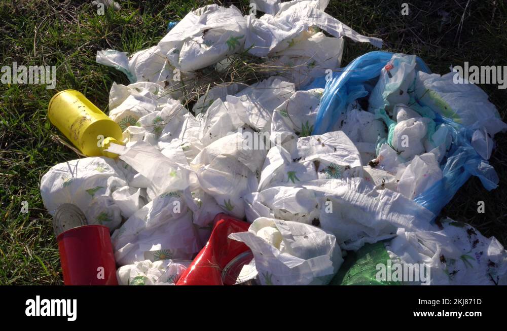 Singleuse disposable plastic baby diapers throwaway in landfill Stock