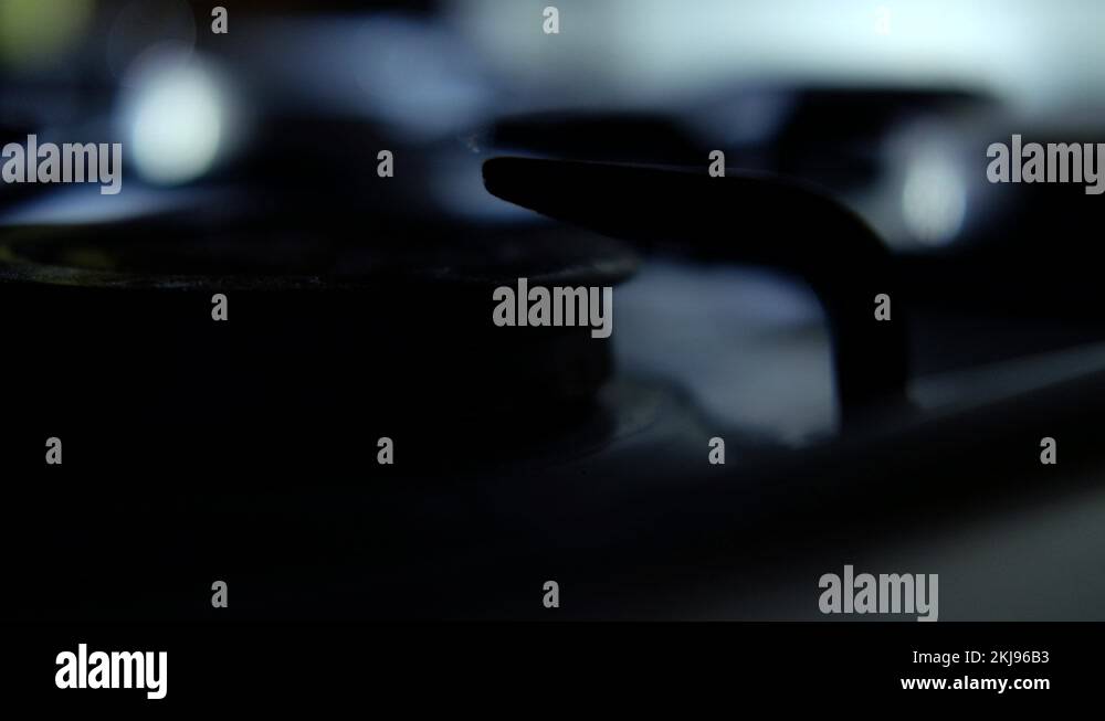 Turning on the cooktop gas cooker. Kitchen burner turning on Stock