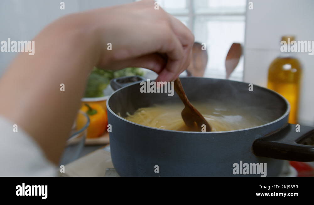 Spaghetti noodle Boiled in boiling water in a pot on the stove Stock