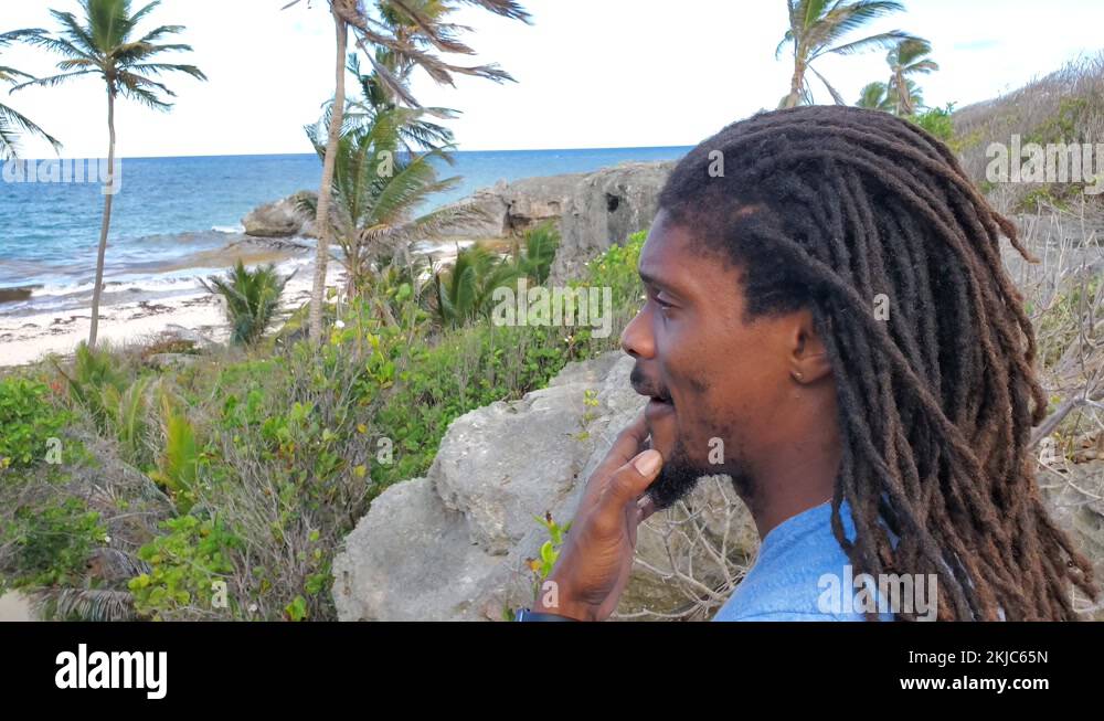 Deadlocked African american man thinking and pulling beard Stock Video