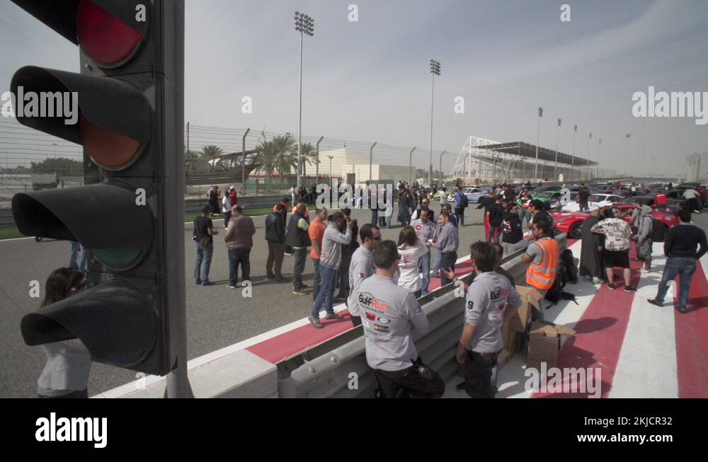 Supercar owners and fans at the starting grid of the Bahrain