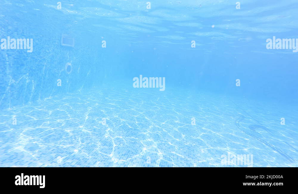 Funny child swim, dive in pool jump deep down underwater from