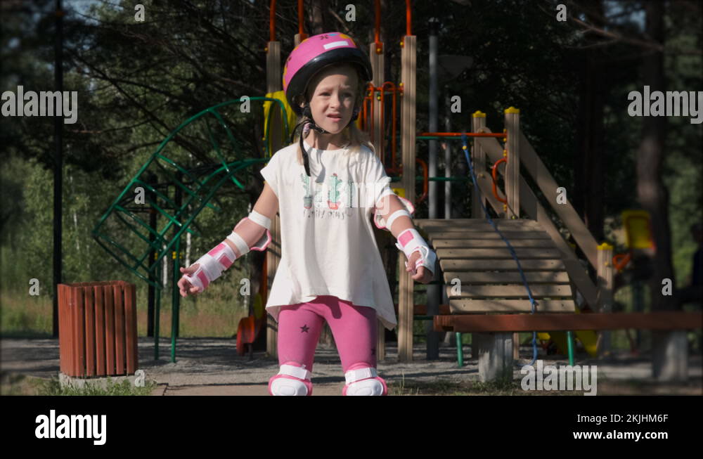 Young girl falling roller skating Stock Videos & Footage HD and 4K