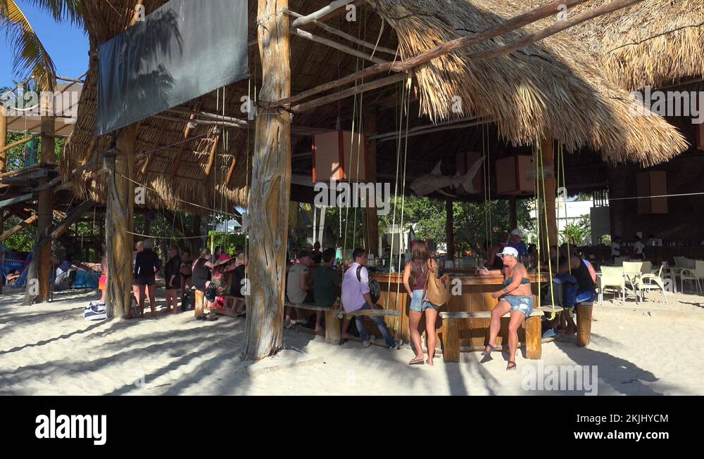Buho's beachside swing bar in Isla Mujeres. Mexico Stock Video Footage