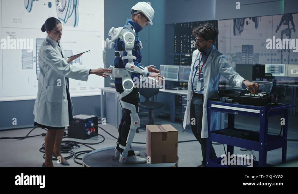 Technology and Development Laboratory Engineers Testing Exoskelet on Person Stock Video Footage
