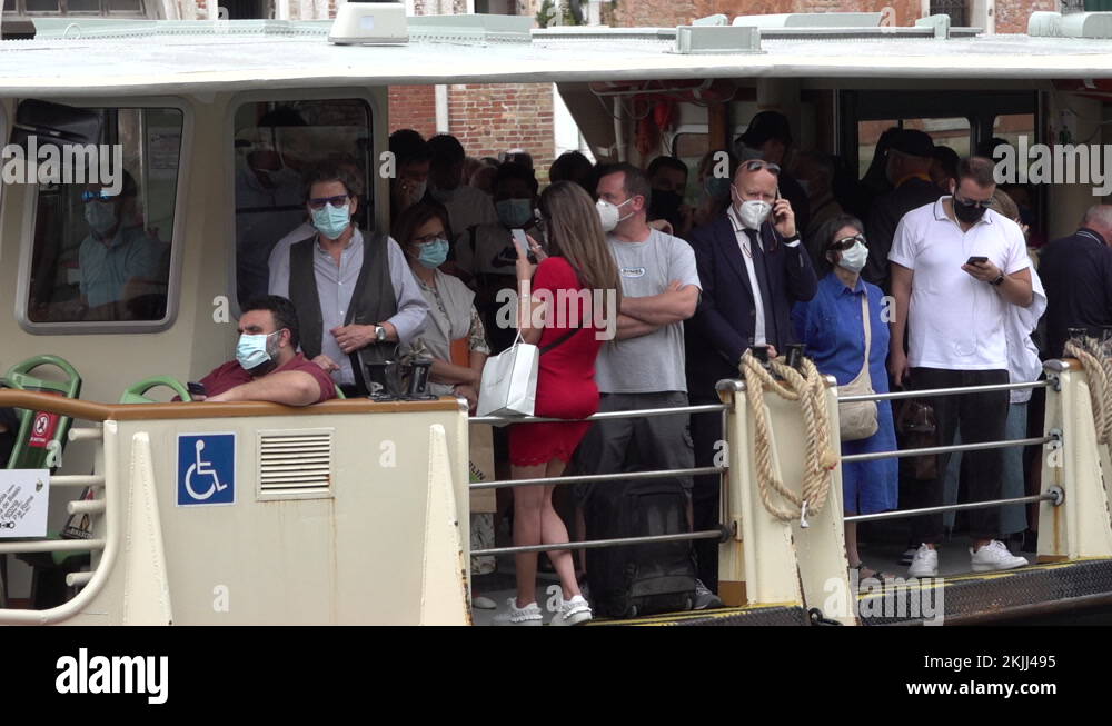 Italy Covid19 coronavirus, ferry passengers wear face masks public transport Stock Video