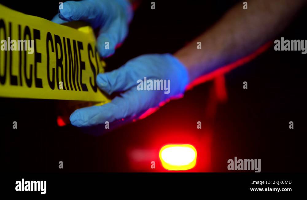 Police Put Up Barricade Tape 'Do Not Cross' At Crime Scene, At Night