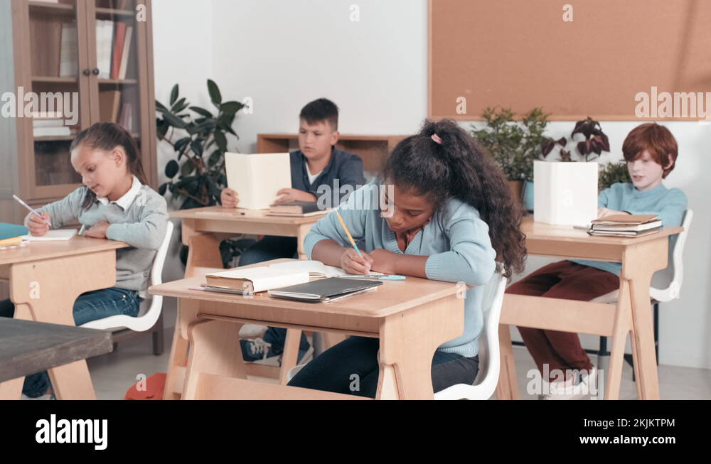 Classroom kids at desks Stock Videos & Footage - HD and 4K Video Clips ...