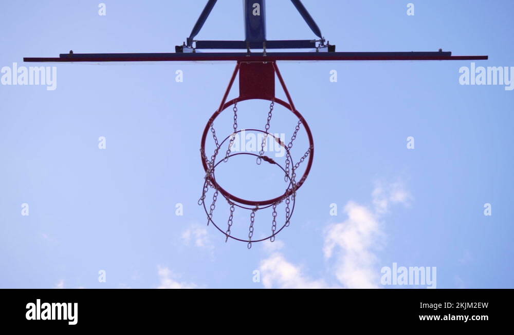 Closeup Basketball Hoop. Ball Flies Into Basketball Hoop And Does Not