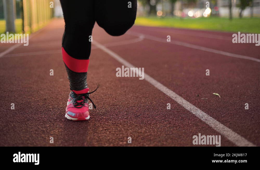 Woman running on spot in stadium Stock Video Footage Alamy