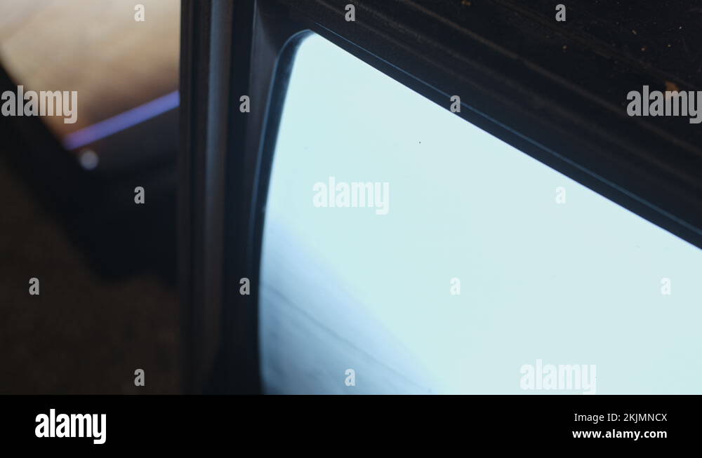 Closeup old TVs broadcast interference. Glitch error video damage