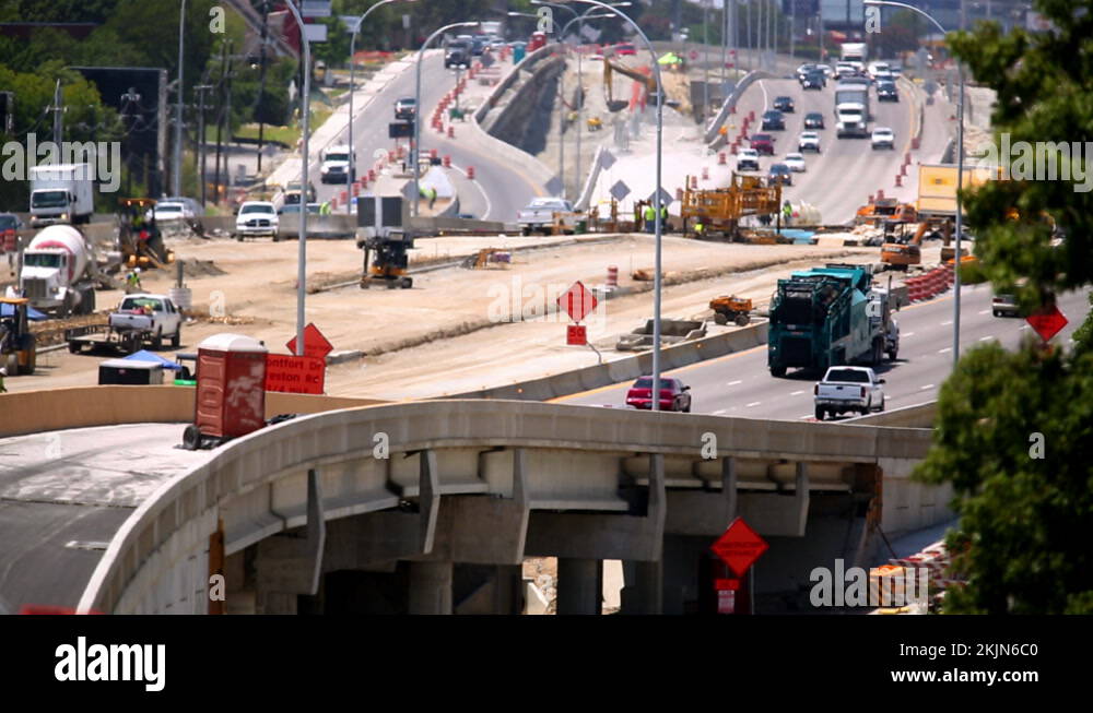 Traffic passing highway construction site, Dallas, Texas, United States