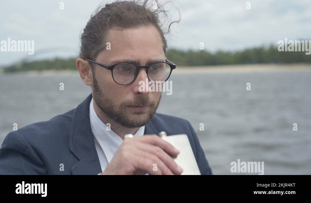 Drinking from flask Stock Videos & Footage HD and 4K Video Clips Alamy