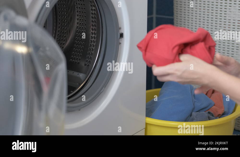 Unload* wet clothes washing machine Stock Videos & Footage HD and 4K